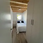 A Casa De Fora Muros